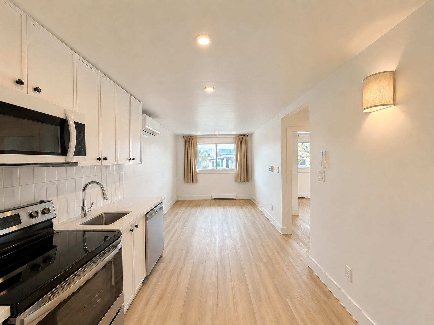 Kitchen and living space at Luc